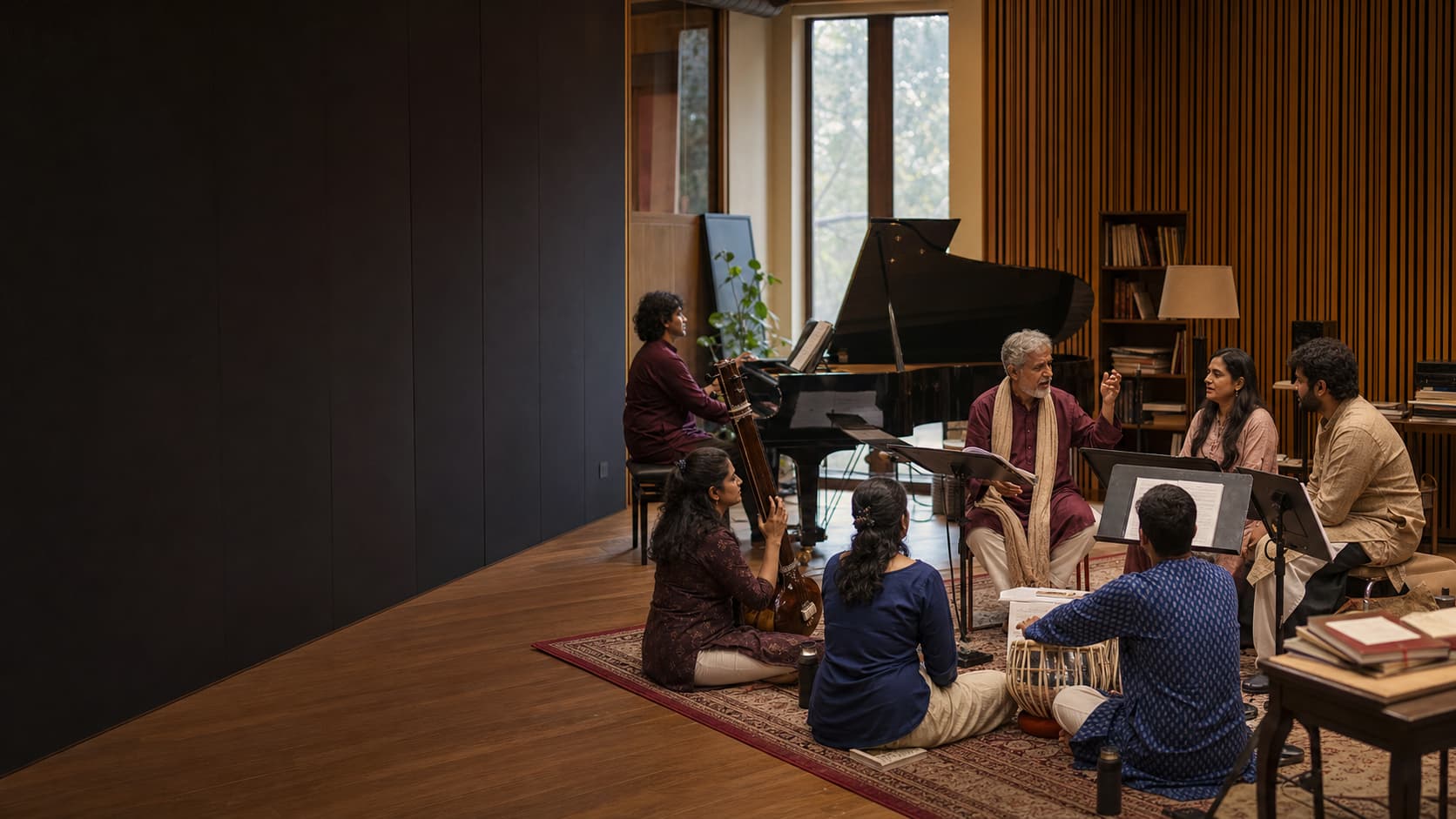 Artists and musicians learning together in a The Neemrana Music Foundation rehearsal studio