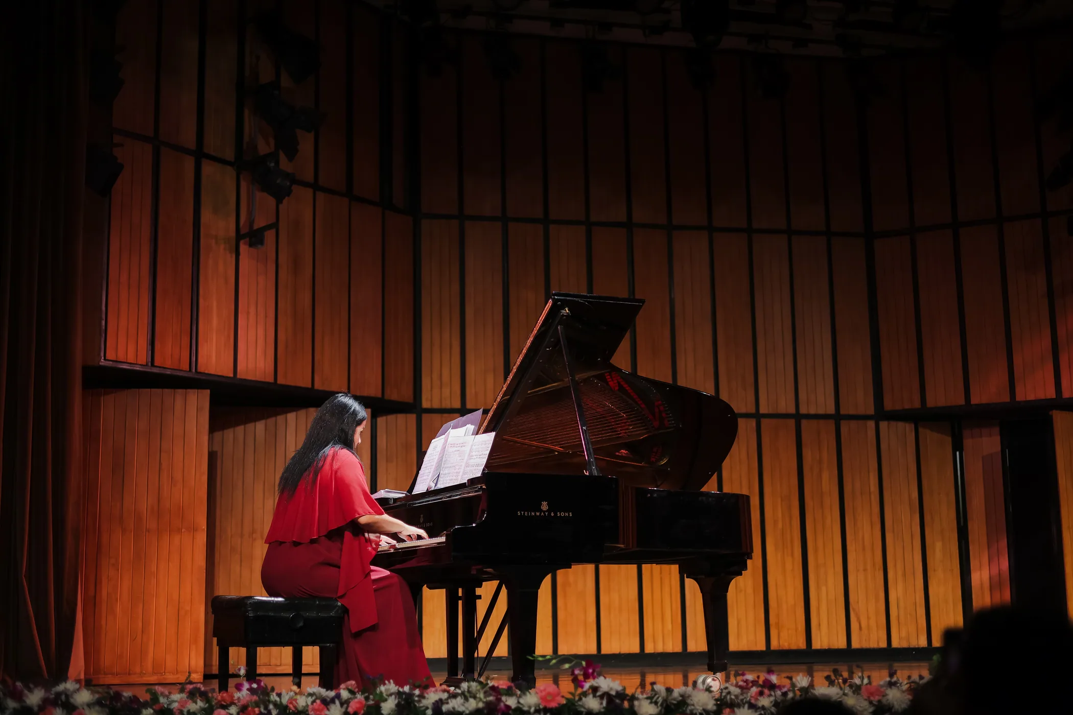 A pianist performing for The Neemrana Music Foundation