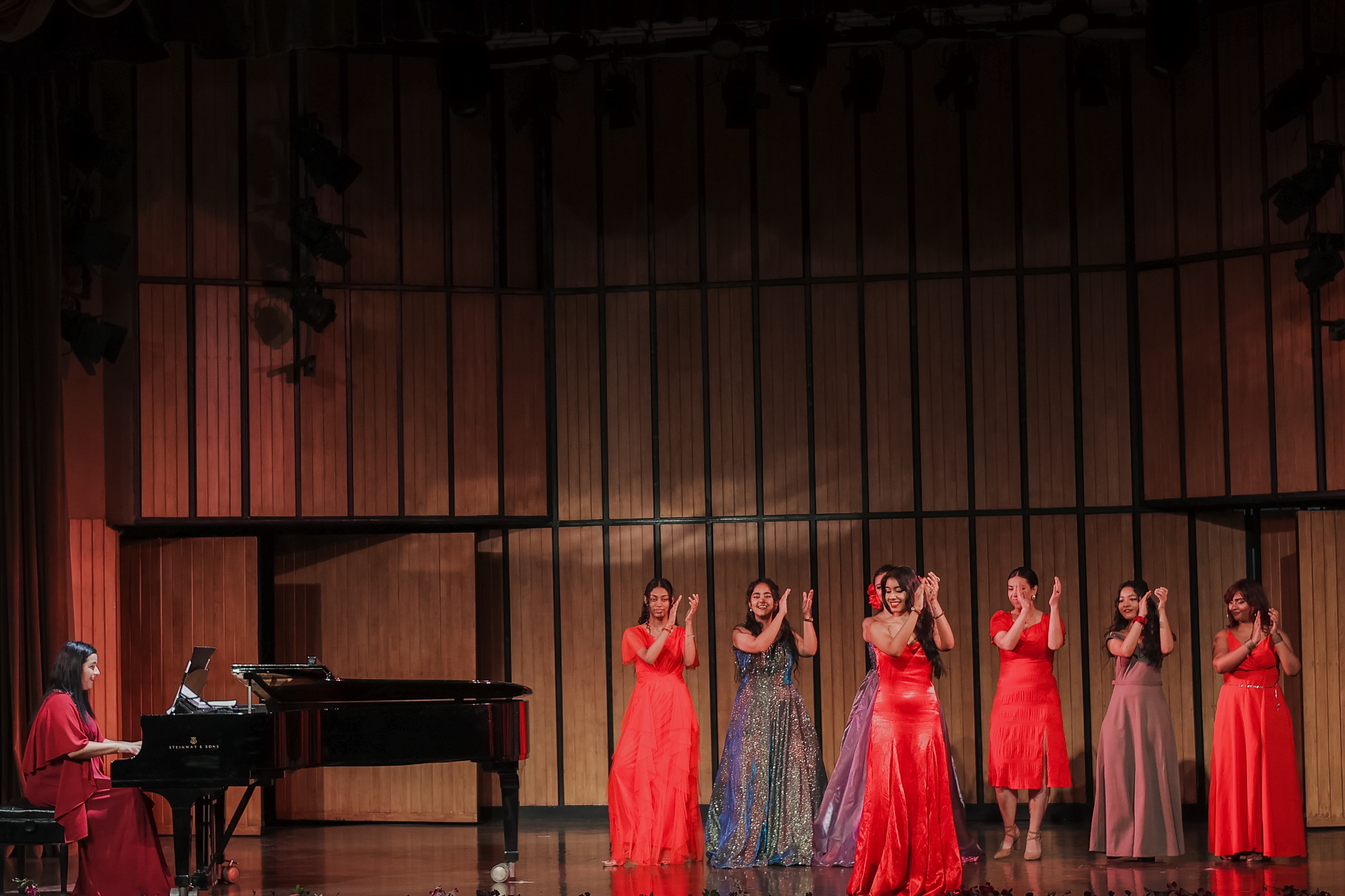 Ensemble Choir members performing with a pianist